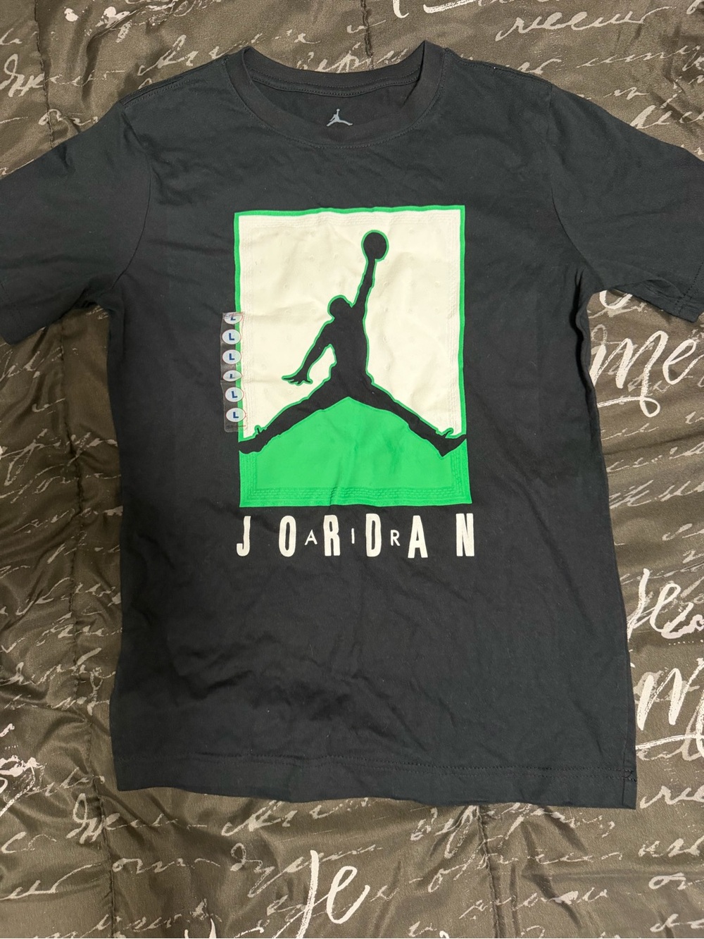 Jordan Black Short Sleeve Tee with Green and White Jumpman Graphic